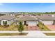 Aerial view of single-story home with attached garage at 531 Tortugas St, Haines City, FL 33844