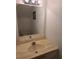 Small bathroom with single sink vanity and toilet at 2222 Silver Pines Pl # 902, Orlando, FL 32808