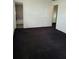 Large bedroom with dark carpet, access to bathroom and loft at 2222 Silver Pines Pl # 902, Orlando, FL 32808