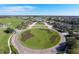 Aerial view of community entrance with circular driveway at 13839 Larkton Ln, Orlando, FL 32832
