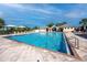 Large community pool with adjacent restrooms and seating at 13839 Larkton Ln, Orlando, FL 32832