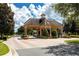 Gated entrance to the community with guard house at 13839 Larkton Ln, Orlando, FL 32832