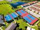 Aerial view of community amenities including tennis and basketball courts at 13839 Larkton Ln, Orlando, FL 32832