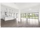 Spacious Gathering room with tile floors and access to backyard at 13839 Larkton Ln, Orlando, FL 32832