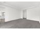 Spacious bedroom with grey carpet and an ensuite bathroom at 13839 Larkton Ln, Orlando, FL 32832