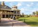 Elegant clubhouse with golf cart parking and manicured landscaping at 13839 Larkton Ln, Orlando, FL 32832
