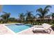 Inviting private pool with spa and plenty of lounge chairs at 751 Lasso Dr, Kissimmee, FL 34747