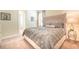 Bedroom with king-size bed and access to bathroom at 751 Lasso Dr, Kissimmee, FL 34747