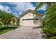 Two-car garage with paver driveway at 4028 Navigator Way, Kissimmee, FL 34746
