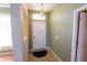 Light and airy entryway with tiled floors at 4028 Navigator Way, Kissimmee, FL 34746