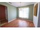 Bright dining room with hardwood floors and a chandelier at 4028 Navigator Way, Kissimmee, FL 34746