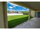 Covered patio overlooking a spacious grassy backyard at 4028 Navigator Way, Kissimmee, FL 34746