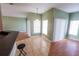 Bright dining room with hardwood floors and chandelier at 4028 Navigator Way, Kissimmee, FL 34746