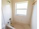 Simple bathroom with a bathtub and shower combination at 4028 Navigator Way, Kissimmee, FL 34746