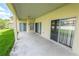 Large covered patio with sliding glass doors at 4028 Navigator Way, Kissimmee, FL 34746