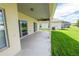 Covered patio offers access to the backyard at 4028 Navigator Way, Kissimmee, FL 34746