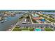 Aerial view showing the community, pool, and waterway access at 335 N Causeway # B010, New Smyrna Beach, FL 32169