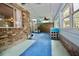 Sunroom with spiral staircase and brick walls at 437 Oak Haven Dr # 437, Altamonte Springs, FL 32701
