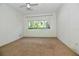 Empty bedroom with carpeted floor and a window at 437 Oak Haven Dr # 437, Altamonte Springs, FL 32701