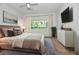 Bedroom with a large window and neutral tones throughout at 437 Oak Haven Dr # 437, Altamonte Springs, FL 32701