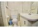 Small bathroom with a toilet and sink, showing some age at 437 Oak Haven Dr # 437, Altamonte Springs, FL 32701