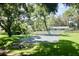 Enjoy a game of basketball in the shaded court at 437 Oak Haven Dr # 437, Altamonte Springs, FL 32701