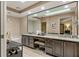 Large bathroom with granite countertop and double sinks at 9525 Mcnorton Rd, Altamonte Springs, FL 32714