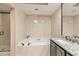 Bathroom with a large bathtub and double sinks at 9525 Mcnorton Rd, Altamonte Springs, FL 32714