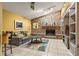 Living room with brick fireplace and built-in shelving at 9525 Mcnorton Rd, Altamonte Springs, FL 32714