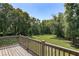 Spacious deck overlooks a large backyard with mature trees at 9525 Mcnorton Rd, Altamonte Springs, FL 32714