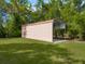 Large storage shed nestled in the backyard at 9525 Mcnorton Rd, Altamonte Springs, FL 32714