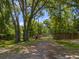 Long private driveway leading to a home at 9525 Mcnorton Rd, Altamonte Springs, FL 32714