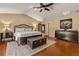 Large bedroom with hardwood floors and plenty of light at 9525 Mcnorton Rd, Altamonte Springs, FL 32714