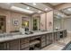 Bathroom with granite countertop, double sinks and large mirror at 9525 Mcnorton Rd, Altamonte Springs, FL 32714