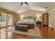Spacious Primary bedroom with hardwood floors and backyard views at 9525 Mcnorton Rd, Altamonte Springs, FL 32714