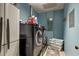 Convenient laundry room with washer, dryer, and extra storage space at 9525 Mcnorton Rd, Altamonte Springs, FL 32714