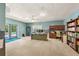 Home office with built-in shelving and plenty of natural light at 9525 Mcnorton Rd, Altamonte Springs, FL 32714