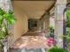 Brick covered patio with tile flooring, offering a shaded outdoor space at 9525 Mcnorton Rd, Altamonte Springs, FL 32714