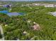Aerial showing home and property in wooded area at 9525 Mcnorton Rd, Altamonte Springs, FL 32714
