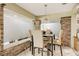 Cozy breakfast nook with brick accent wall and seating for four at 9525 Mcnorton Rd, Altamonte Springs, FL 32714