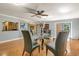 Elegant dining room with hardwood floors and views to kitchen at 9525 Mcnorton Rd, Altamonte Springs, FL 32714