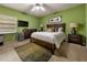Bright bedroom with a comfortable bed, large windows, and ample closet space at 9525 Mcnorton Rd, Altamonte Springs, FL 32714