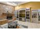 Living room features a brick fireplace and built-in entertainment center at 9525 Mcnorton Rd, Altamonte Springs, FL 32714