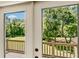 View from deck showcasing expansive backyard, lush greenery, and fenced area at 9525 Mcnorton Rd, Altamonte Springs, FL 32714