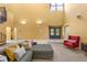 Open living area with sectional sofa and access to other rooms at 9525 Mcnorton Rd, Altamonte Springs, FL 32714