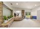 Finished basement with stone wall, access to backyard, and ample space at 9525 Mcnorton Rd, Altamonte Springs, FL 32714