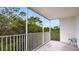 Spacious screened balcony with a view of the surrounding landscape at 1150 Carmel Cir # 408, Casselberry, FL 32707