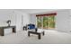 Living room with balcony access and ample natural light at 1150 Carmel Cir # 408, Casselberry, FL 32707