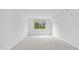Bright and airy bedroom with neutral carpeting and a window at 1150 Carmel Cir # 408, Casselberry, FL 32707