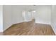 Bright and airy living room with wood floors and archway at 8712 The Esplanade # 19, Orlando, FL 32836